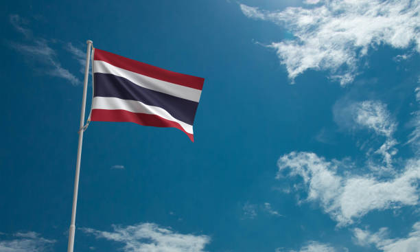 istock Thailand flag waving red blue white three 3 color blue sky cloud background wallpaper copy space country national travel business politic election bangkok government siam buddha religion thai culture 1639149930