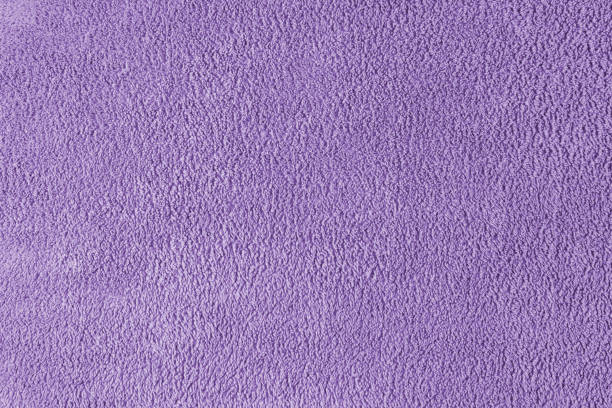 istock Terry cloth, violet towel texture background. Soft fluffy textile bath or beach towel material 1639170792