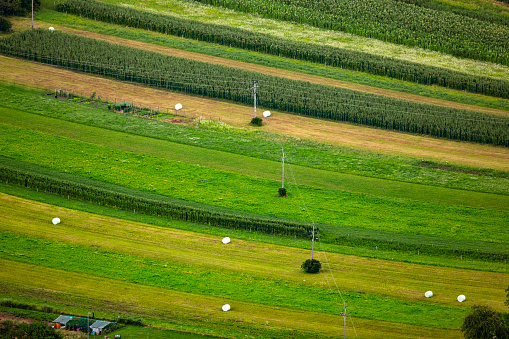 Agricultural Fields With Hay Bales From High Angle View.