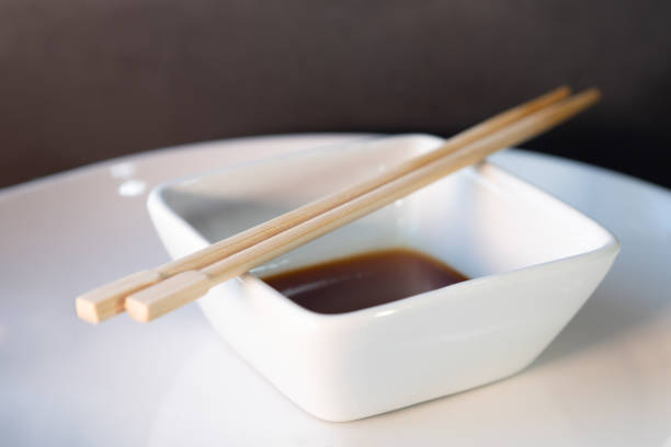 istock Chopsticks on a plate with soy sauce. Selective focus 1639176982