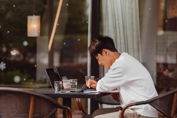 istock Young freelancer working at coffee shop 1639247317