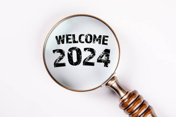 istock Welcome 2024. Magnifying glass on a white background 1639251678