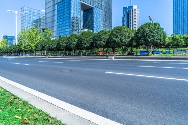 istock empty urban road with modern building in the city 1639289210