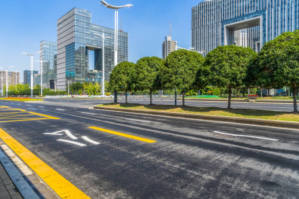 istock empty urban road with modern building in the city 1639289729