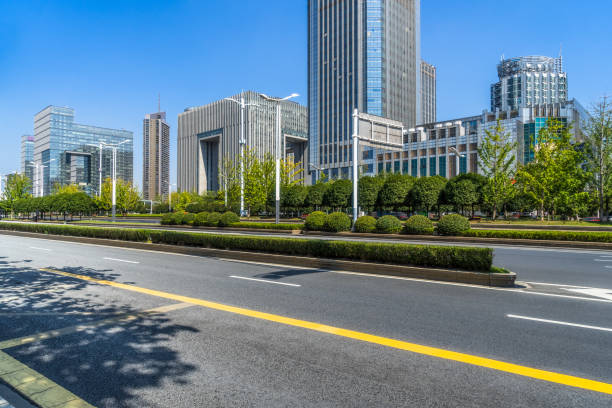 istock empty urban road with modern building in the city 1639290250