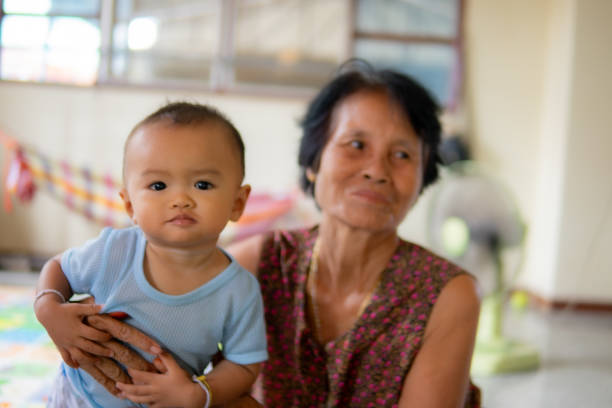 istock Grandmother feeds her grandson with love 1639294192