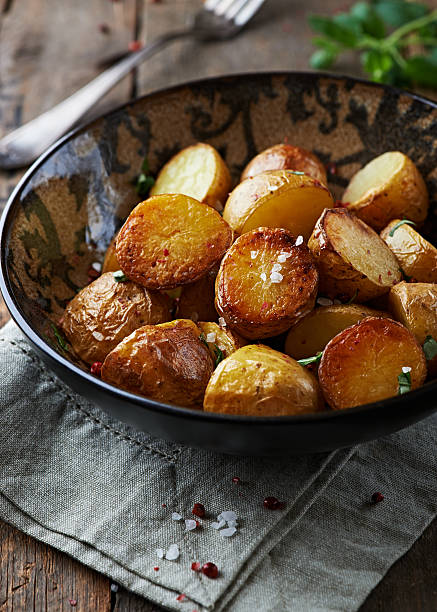 istock Oven-baked potatoes with sea salt and herbs 163932967