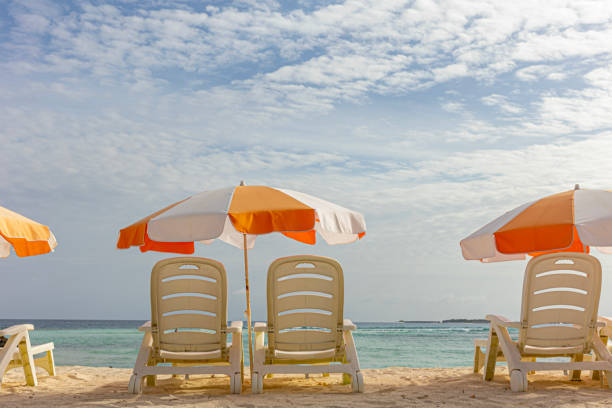 istock Holiday whith beach and blue sky 1639394261