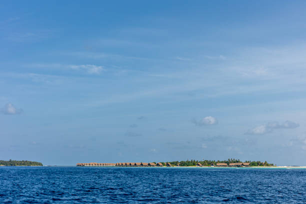 istock Holiday whith beach and blue sky 1639394496