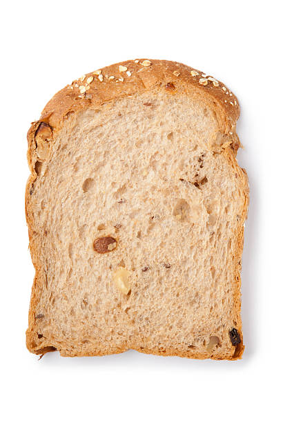 istock Sliced whole wheat bread with raisin and walnut 163939602