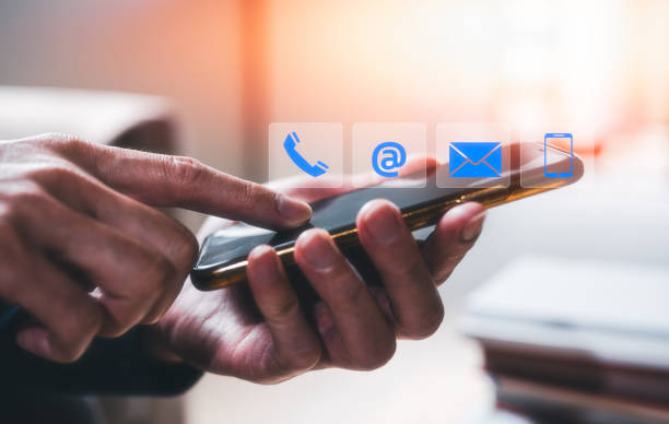 istock Businessman using smartphone  searching web, browsing information, contact, having workplace at home. concept Contact us or Customer support hotline people connect 1639403445