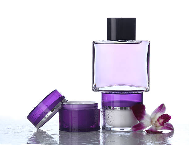 istock Moisturizers and perfume on white with orchid 163942949
