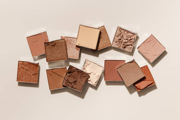 istock Beauty product neutral color eyeshadows for makeup, beige monochrome pattern on light background, flat lay with nude colors swatches eyeshade, cosmetic texture, beige color palette, top view pattern 1639433343