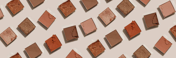 istock Minimal pattern with Natural colored eye shadow makeup palette, crushed face powder swatches. Woman cosmetic and beauty product, aesthetic cosmetics wide banner, beige color eyeshadow 1639433860