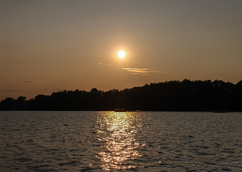 In this shot six sunset pics were merged into one at Lake Sinclair in Milledgeville, Georgia.