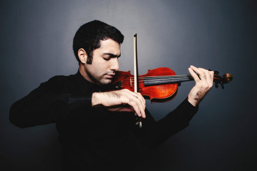 Musician playing violin.