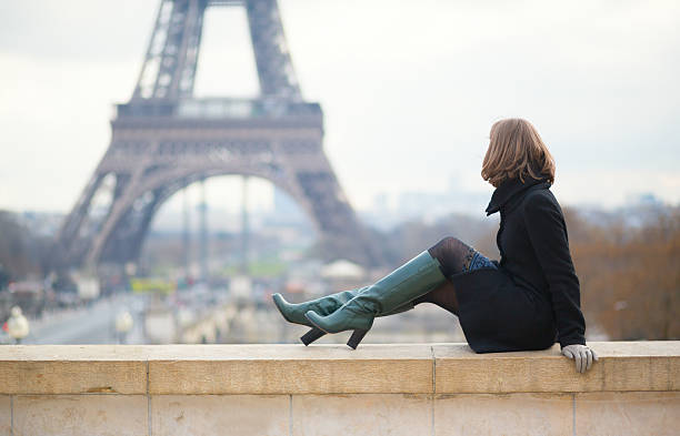 istock Woman looking at the Eiffel tower 163956953