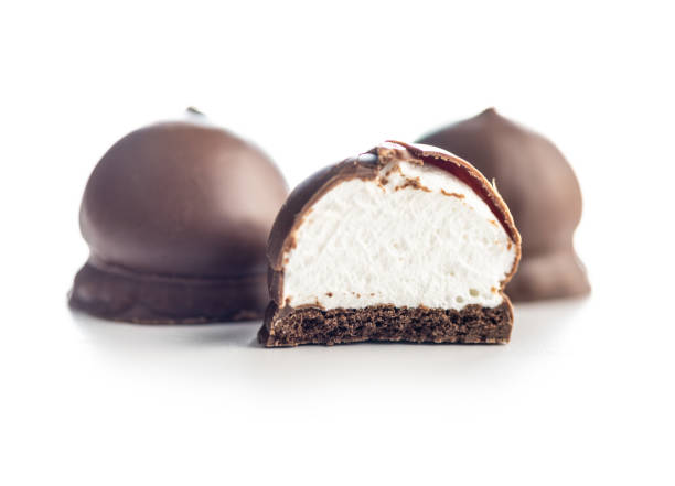 istock Chocolate covered marshmallows. Sweet dessert isolated on white background. 1639635266