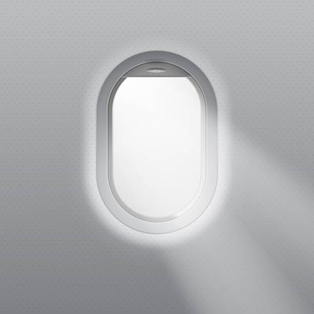 istock Realistic vector illustration of an airplane porthole with rays of light. 1639644781