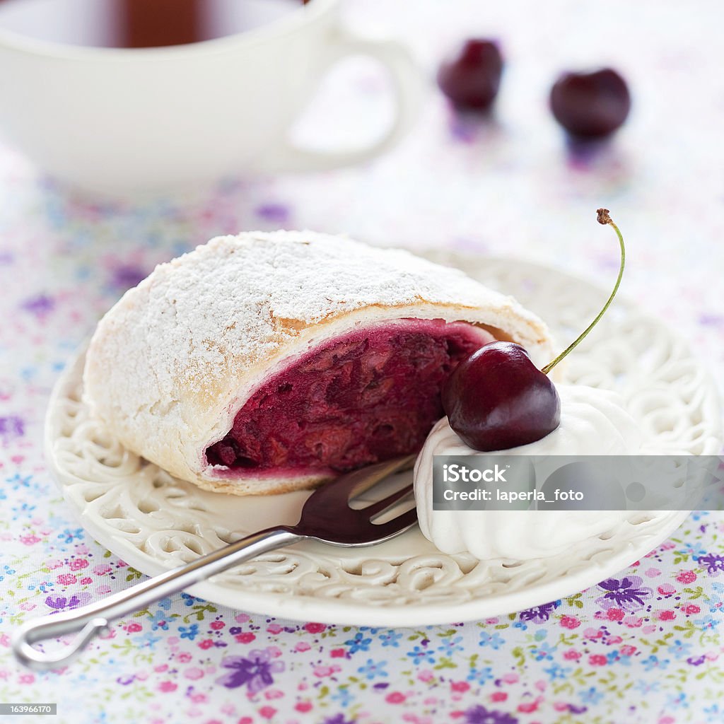 Cherries strudel Cherry strudel with almonds, selective focus Baked Pastry Item Stock Photo