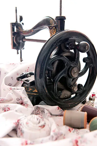 Antique sewing machine and sewing kit.