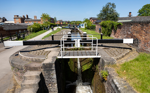 Stone Staffordshire, uk, may 20 2023  A waterside view of Stone lock, seen from a narrowboat