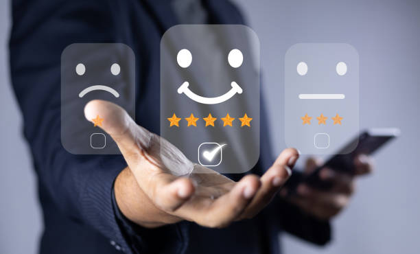 istock Customer or User give rating to service experiences review satisfaction feedback survey on online application, Customer can evaluate quality of service leading to reputation ranking of business. 1639797283
