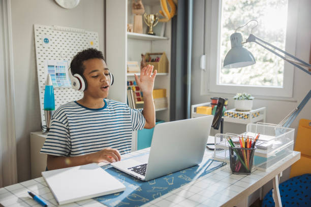 istock Teenage boy studding at home 1639819965