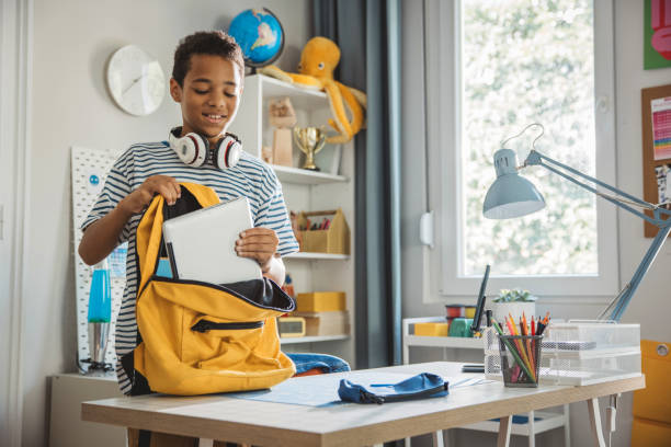 istock Teenage boy studding at home 1639820490