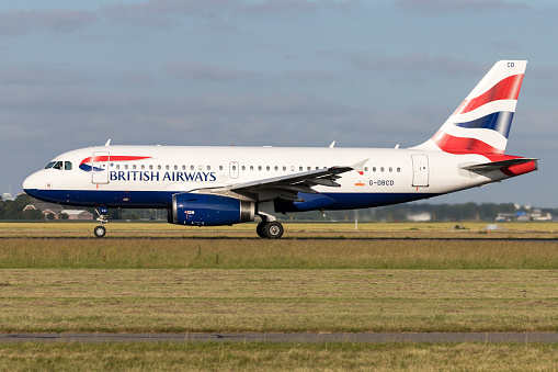 Vijfhuizen, Netherlands - June 27, 2019: British Airways Airbus A319-100 with registration G-DBCG on take off roll on runway 36L (Polderbaan) of Amsterdam Airport Schiphol.
