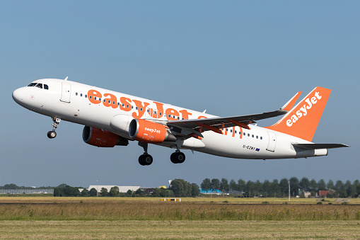 Vijfhuizen, Netherlands - June 28, 2019: British easyJet Airbus A320-200 with registration G-EZWY taking off runway 36L (Polderbaan) of Amsterdam Airport Schiphol.