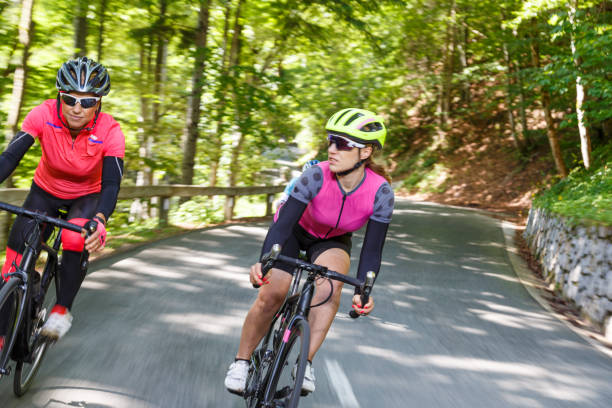 istock Female friends cycling 1639862765