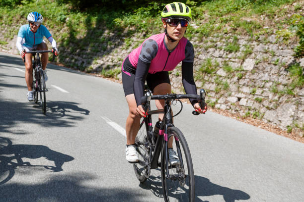 istock Female friends cycling 1639864980
