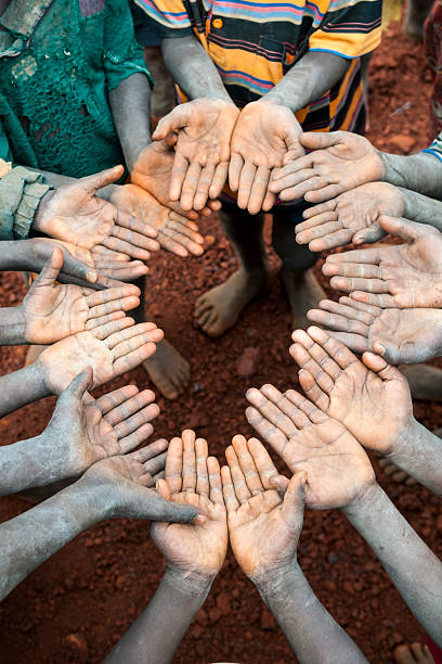 istock Ethiopian children with open hands 163986918