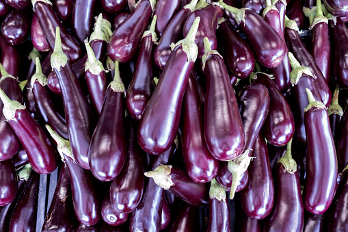 aubergines at market