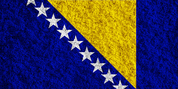 Flag of Bosna i Hercegovina on a textured background. Concept collage.