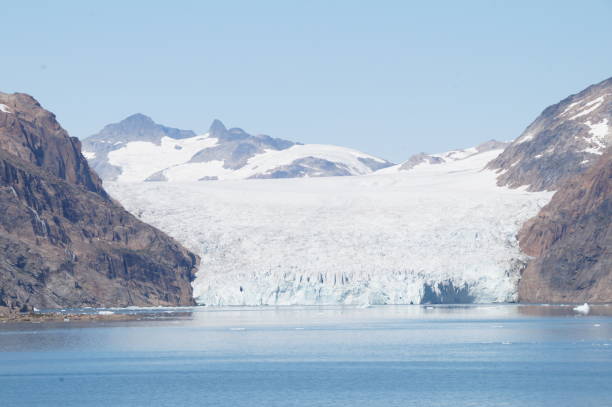 istock A sunlit large glacier is seen ahead between the mountains 1639920270