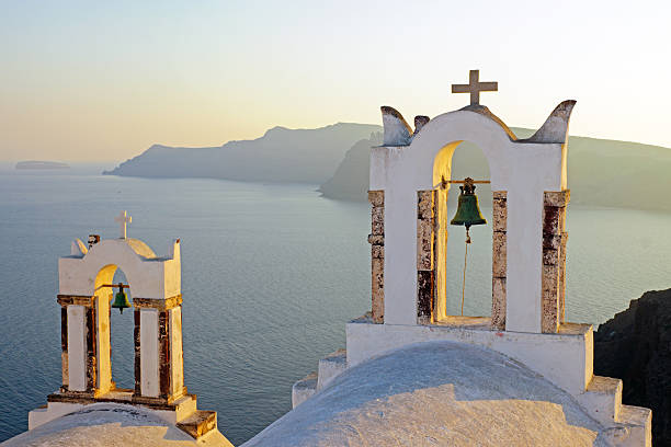 istock Belltowers at sunset in Oia 163993219