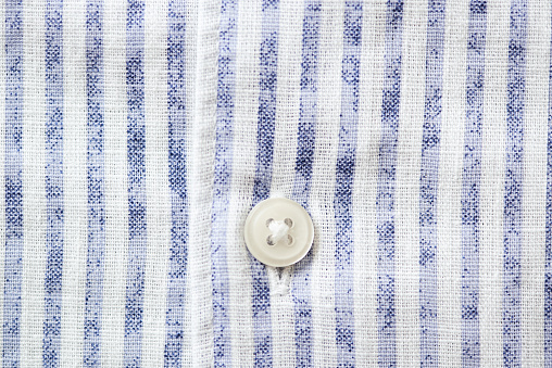 Close up of men's striped shirt. Soft focus.