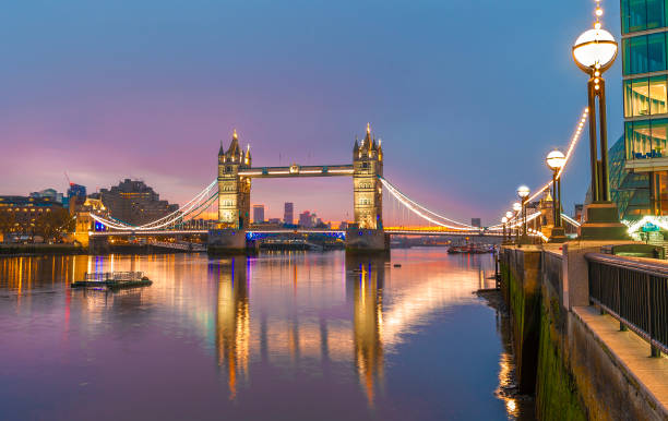 istock Tower Bridge illuminated by the sunrise light in London 1639944511