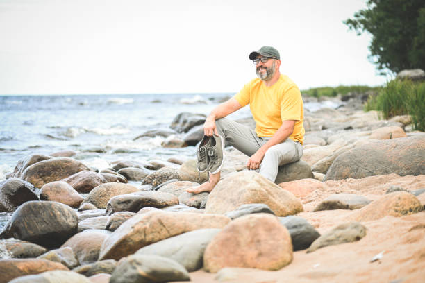 man enjoying nature by the lake