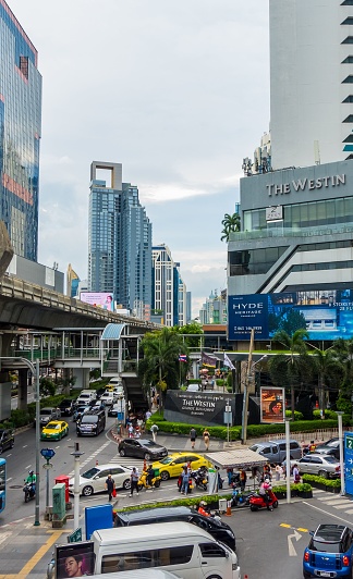 Bangkok, Thailand – June 17, 2023: The bustling traffic and modern architecture in Sukhumvit, Bangkok