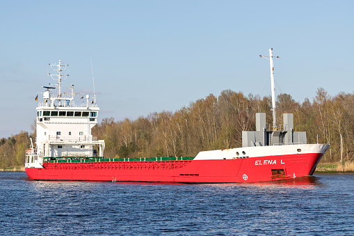 Beldorf, Germany - April 8, 2019: general cargo ship ‘Elena L’ in the Kiel Canal