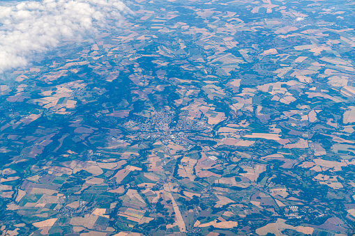 Aerial view of earth resembling military camouflage suit.