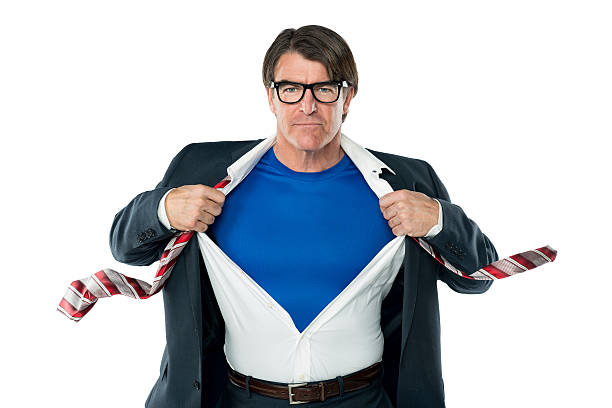 Superhero Mid forties Superhero opening his shirt to reveal copy space superhero photos stock pictures, royalty-free photos & images