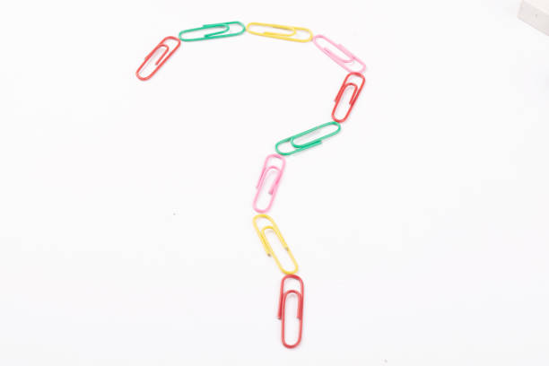 istock Question mark created by paperclip on white background 1640058494