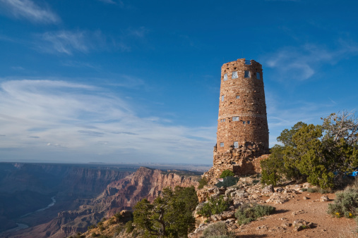 The Desert View Watchtower is a 70-foot high stone building located on the South Rim within Grand Canyon National Park in Arizona, USA. The four-story historic structure, completed in 1932, was designed by American architect Mary Colter who also created and designed many other buildings in the Grand Canyon vicinity including Hermit's Rest and the Lookout Studio.