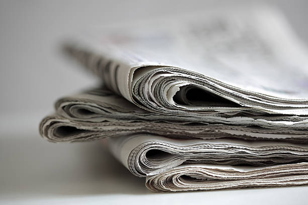 quotidiano - close up newspaper folded document foto e immagini stock