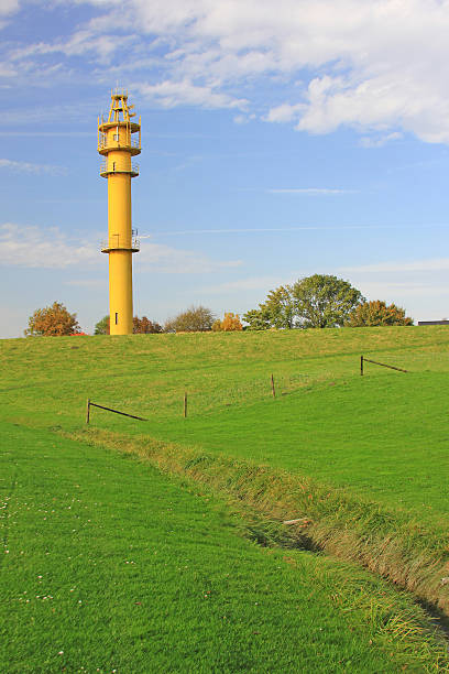 istock Lighthouse Schillig on the dike, North Sea, Germany 164007227