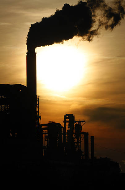 istock industry smoke sky smog chimney sunset 164008712